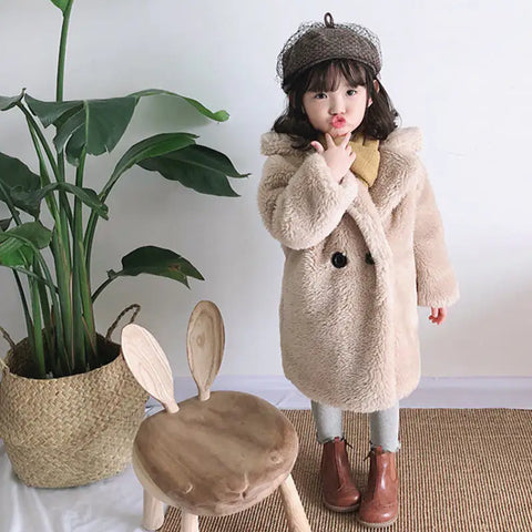 Fur coat for children in autumn and winter