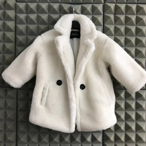 Fur coat for children in autumn and winter