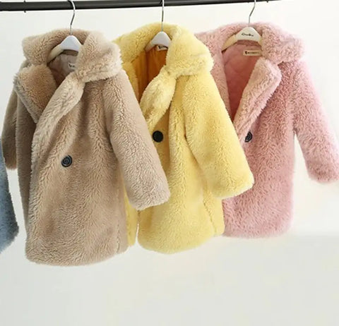 Fur coat for children in autumn and winter