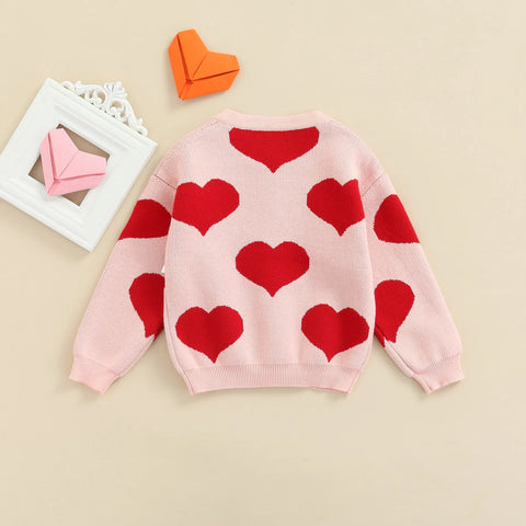 Knitted baby sweater with heart