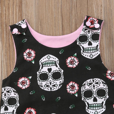 baby romper with skull motif
