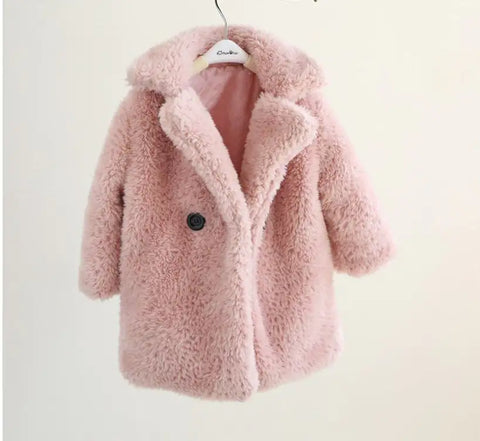 Fur coat for children in autumn and winter