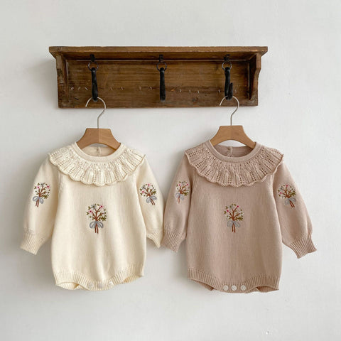 Knitted onesies with autumnal design
