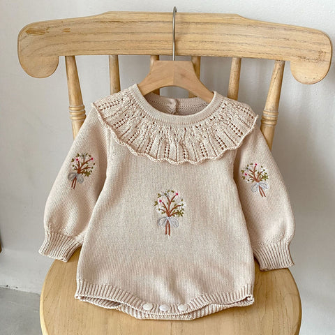 Knitted onesies with autumnal design