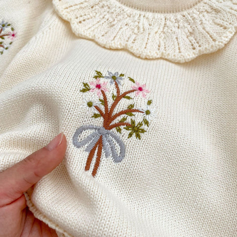 Knitted onesies with autumnal design