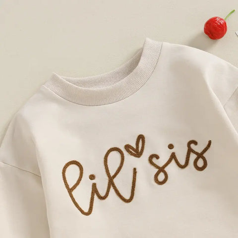 Matching rompers and sweater outfits for sisters with Sister Logo and long sleeves